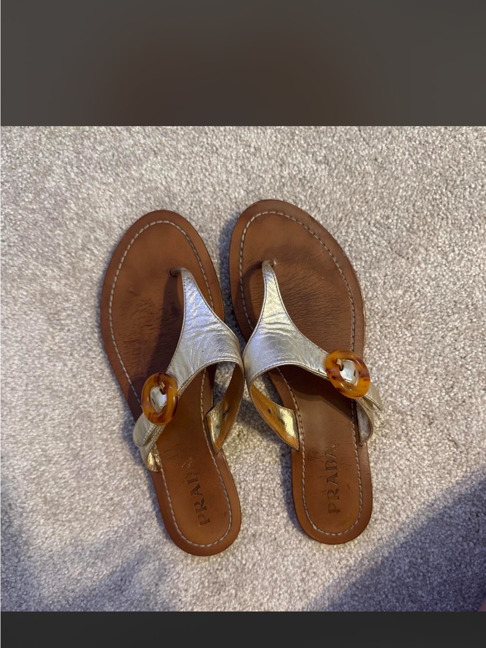 Prada Gold Leather Thong Sandals with Amber Accent Buckle